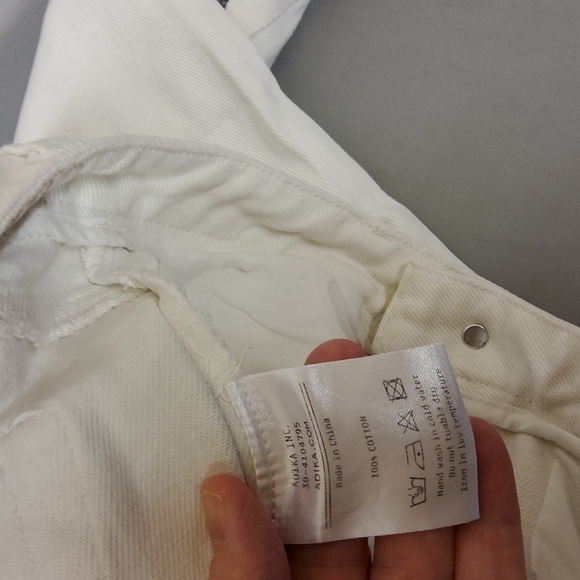 ADIKA jeans white with black flames accents lower legs. NWOT size small - Picture 5 of 5